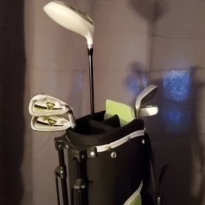 Golf clubs ( missing some)and bag